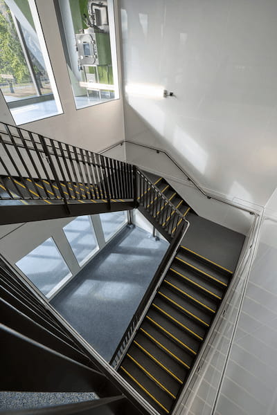 Arcoplast. Acryloyl wall ceiling paneling system used in stairwell for PC3, PC-3, BSL3, BSL-3, BSL 3